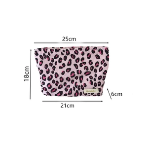 Pink leopard print canvas makeup bag with size dimensions showing 25x21x18x6 cm