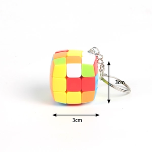 Close-up of a 3cm mini 3x3 colorful magic cube keychain with a sturdy metal ring