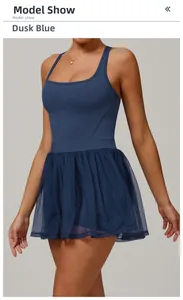 Detail view of twilight blue athletic mesh dress with straps and pleated skirt