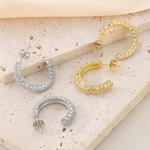Luxury C-shaped stainless steel earrings with sparkling gold and silver crystal settings