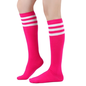 Close-up of rose red knee-high socks with three white stripes and premium knit texture