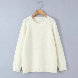 Classic cream mohair knit sweater with raglan sleeves and ribbed crewneck design