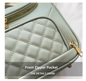 Light green quilted cosmetic bag with gold zippers, large capacity travel toiletry pouch.
