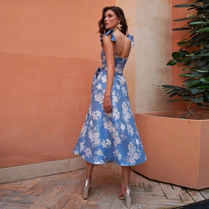 Light blue floral midi dress with ruffle sleeves and open back design for summer