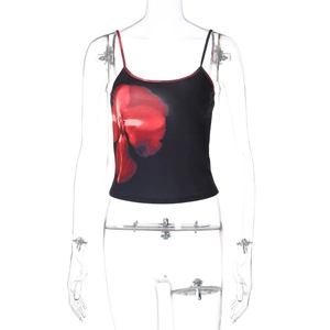 Detail of crop top with red floral print on black fabric and slim shoulder straps