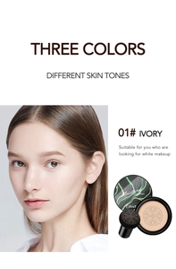 Detail view of moisture cushion foundation 01 Ivory with mushroom head puff and marble lid