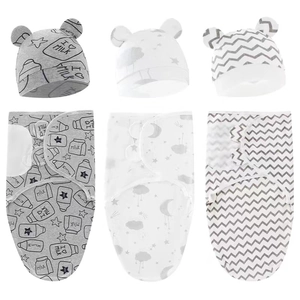 Detailed set of cotton swaddle blankets and beanies with milk, star, and chevron patterns