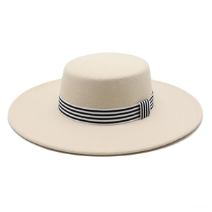 Beige wide brim wool felt boater hat with stylish black and white striped ribbon band