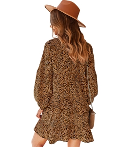 Back view of a casual leopard print mini dress with lantern sleeves and tiered skirt