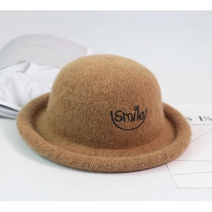 Close-up of brown wool felt hat with smile embroidery and a rolled brim for kids