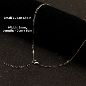 Detail of a 2mm silver Cuban link stainless steel necklace with 40+5cm length