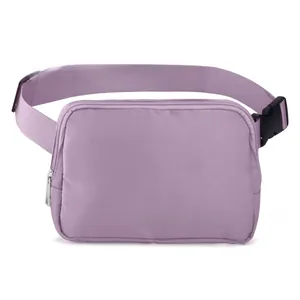 Close-up of purple nylon waist bag with durable zipper and wide woven shoulder strap