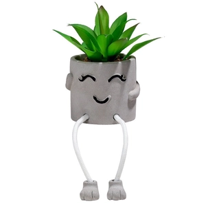 Minimalist concrete succulent planter with hanging legs doll and artificial plant