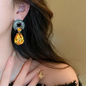 Vintage water-drop geometric earrings with blue micro-diamonds and yellow amber gems