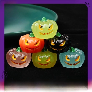 Luminous 3D Halloween resin pumpkin charms in vibrant colors for festive DIY decoration