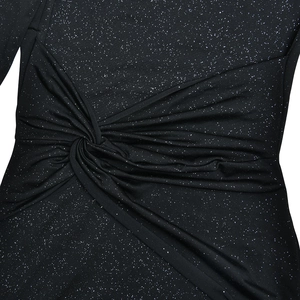 Detail of black fabric with silver glitter featuring elegant ruched knot design