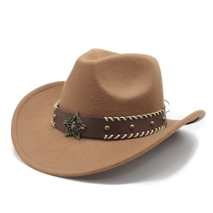 Detail of brown cowboy hat featuring leather band with star badge and metallic studs