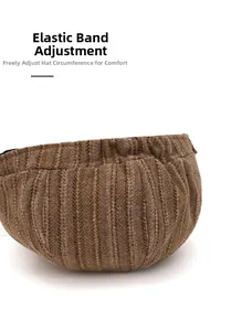 Detail of adjustable elastic band on brown striped newsboy cap for custom fit