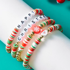 Detail of Christmas beaded bracelet set with Santa pendants and Happy Christmas beads