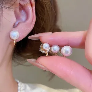 Elegant white pearl clip-on earrings in three sizes with gold-tone metal base