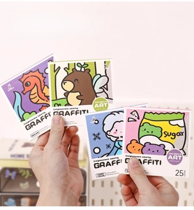 Close-up of a 25-page cartoon coloring book for kids with ocean and fairy tale themes