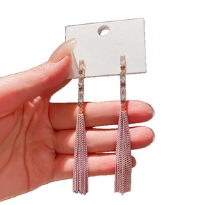 Elegant gold chain tassel earrings with purple crystals and silver pins for women