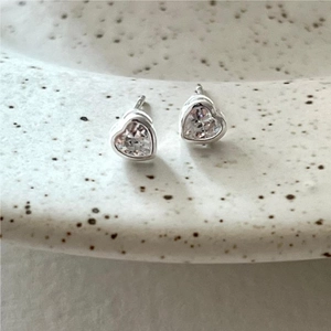 Minimalist 925 sterling silver heart-shaped stud earrings with sparkling clear zircon stones