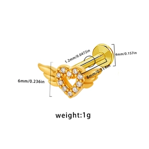 Detailed view of gold winged heart stud with specific size and weight measurements