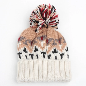 Detailed knit texture and color-block geometric pattern on the warm winter hat