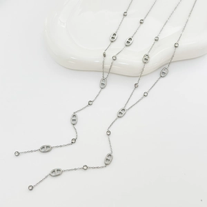 Classic stainless steel necklace with hollow oval link accents and crystal tassels
