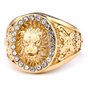Detailed close-up of golden lion head ring with sparkling white zircon stones and ornate engraving