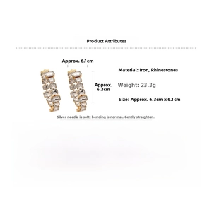 Detail view of large geometric gold hoop earrings with crystal rhinestones 6.3cm size