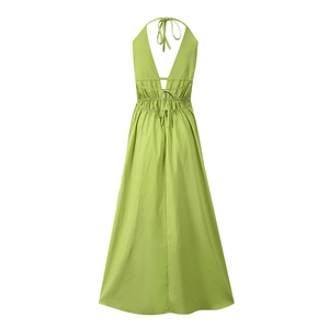 Detail of apple green backless halter dress with waist tie and premium woven texture