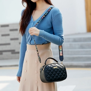 Black quilted rhombic crossbody bag with colorful LOVE wide fabric shoulder strap