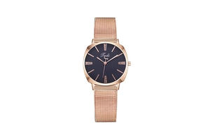 Detail of rose gold mesh band and faceted bezel on women's crystal quartz watch