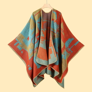 Detail of color-block knit shawl with geometric patterns and reinforced edge stitching