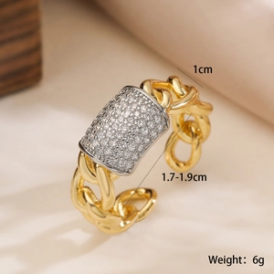 Detail shot of a two-tone gold chain ring with silver rectangle pavé zircon setting