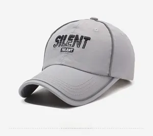 Detail of SILENT 3D embroidery on light grey quick-dry sports baseball cap