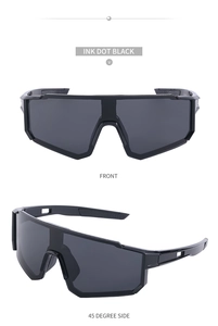 Detail view of black ink dot sports sunglasses with wraparound shield lens and frame