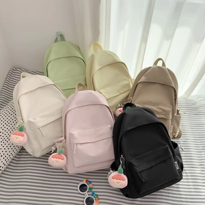 Minimalist nylon casual backpacks for students in six trendy colors with peach charms
