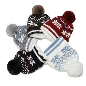 Winter knit beanies set featuring Nordic snowflake jacquard patterns and faux fur pom-poms