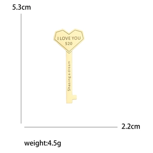 Golden heart-shaped key brooch with I Love You engraving and size measurements