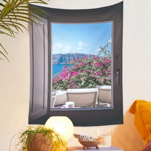 Detail of Mediterranean wall tapestry showing blue sea and pink flowers in home setting