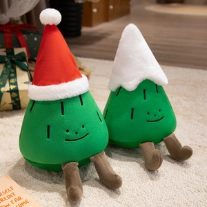 Plush Christmas tree dolls with red and white festive hats on soft white carpet