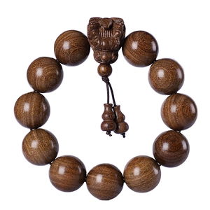Classic Golden Sandalwood beads bracelet with PiXiu pendant and gourd charms on white background