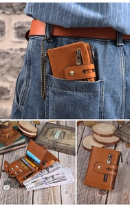 Brown leather wallet with metal anti-theft chain featuring card slots and coin pocket