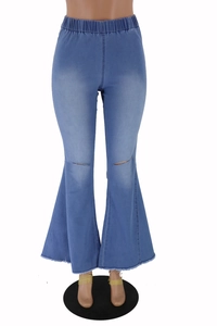 Detail of high-waist stretch denim flare pants with ripped knees and bell-bottom hemline
