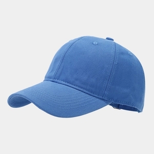 Detailed side view of blue cotton baseball cap showing 6-panel structure and curved brim