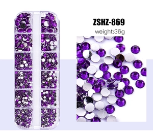 Detail of 12-grid box with assorted purple resin flatback rhinestones for nail art DIY
