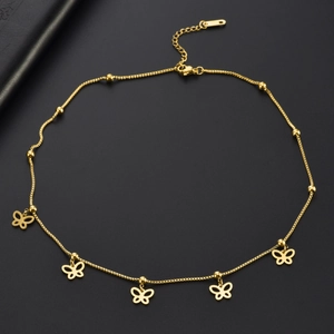 Elegant gold titanium steel necklace with hollow butterfly charms and bead accents